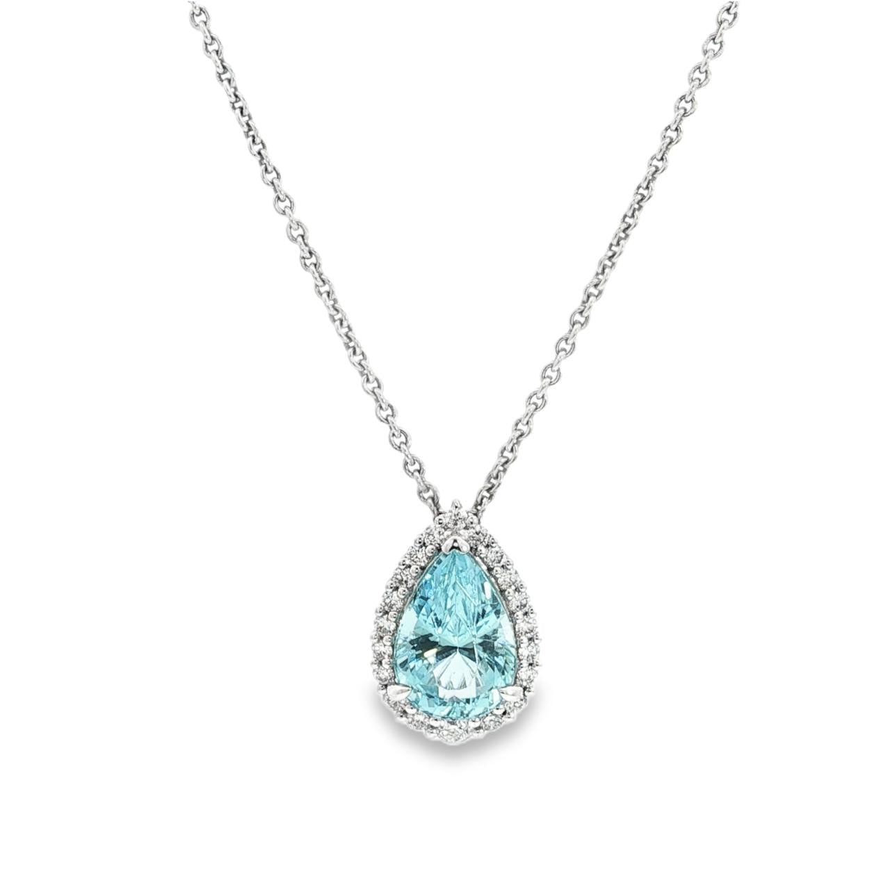 18ct white gold pendant featuring a 3.14ct pear-cut aquamarine in a three-claw setting with a graduated diamond halo surround and concealed pendant runner.