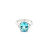 18ct white gold three-stone ring featuring a 3.44ct cushion cut aquamarine with two half moon cut diamond side stones.