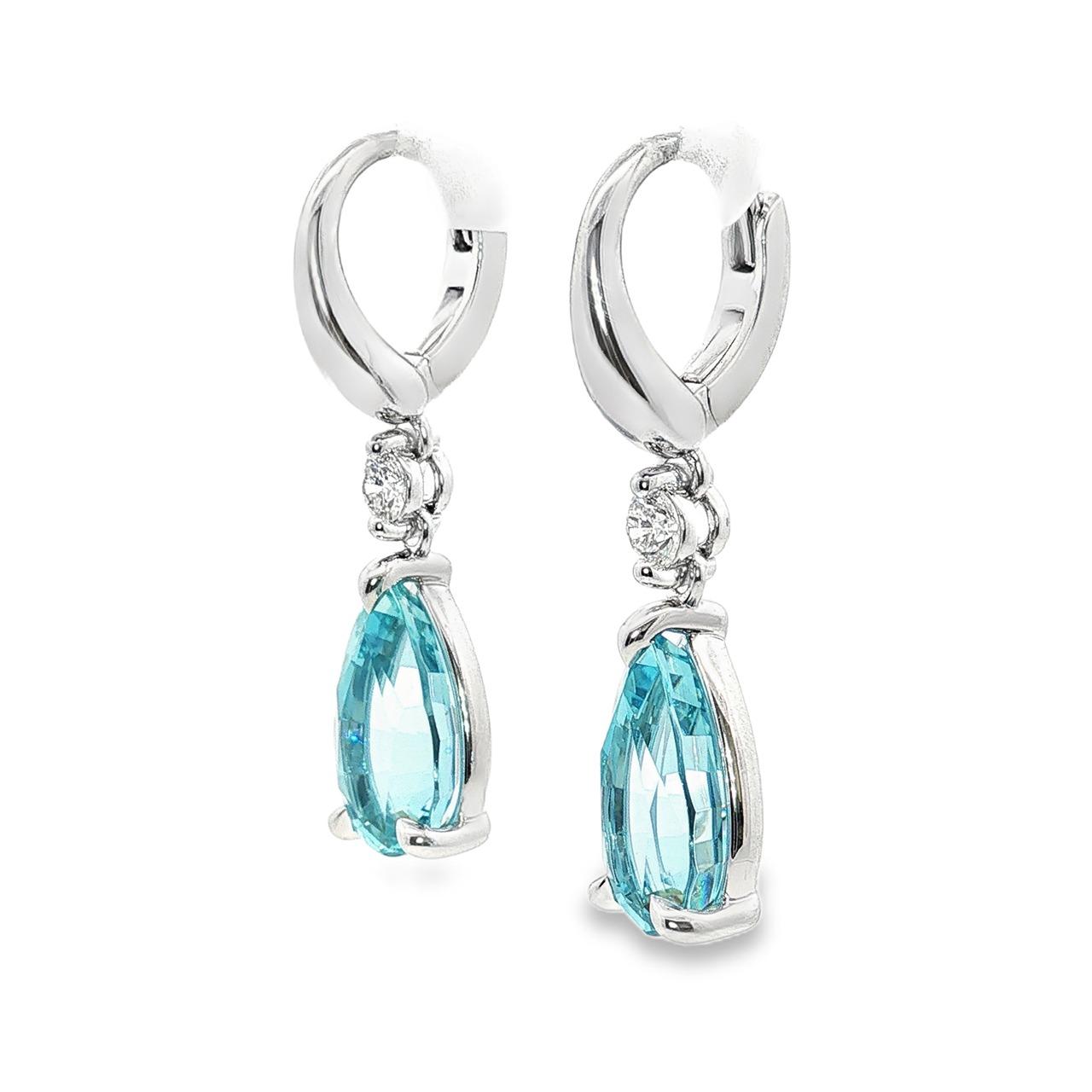18ct white gold aquamarine and diamond drop earrings with pear cut stones