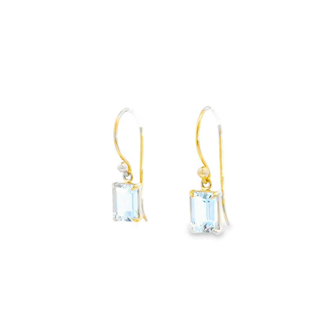 9ct yellow gold drop earrings featuring 7x5mm emerald-cut aquamarines in four-claw settings with hook fittings.