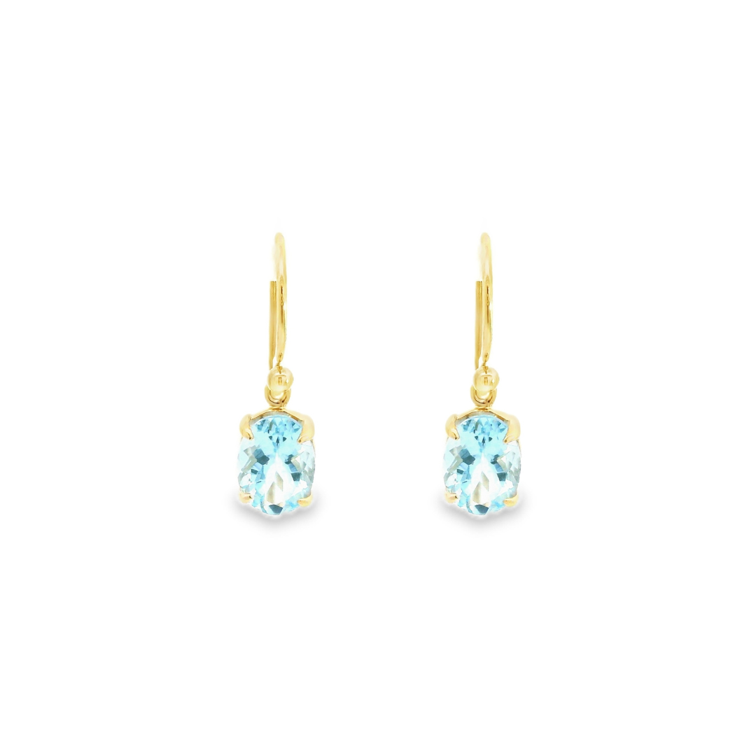 9ct yellow gold drop earrings featuring 8x6mm oval-cut aquamarines in four-claw settings with hook fittings.