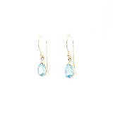 9ct yellow gold drop earrings featuring 8x5mm pear-cut aquamarines in v-cap and claw settings with hook fittings.