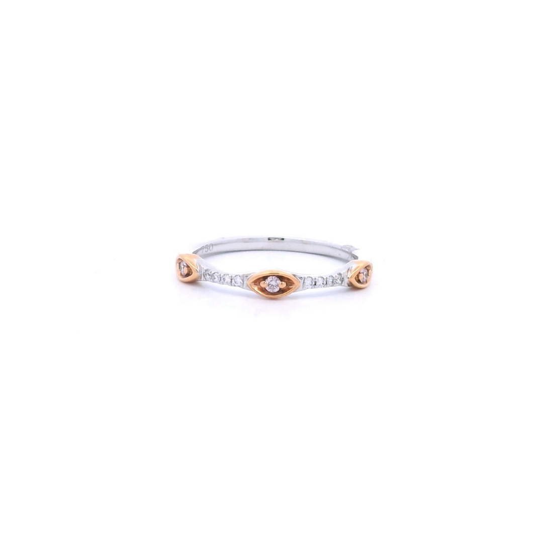 Two-tone white and rose gold ring featuring Argyle pink diamonds in marquise-shaped bead settings with white diamond claw accents.