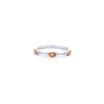 Two-tone white and rose gold ring featuring Argyle pink diamonds in marquise-shaped bead settings with white diamond claw accents.
