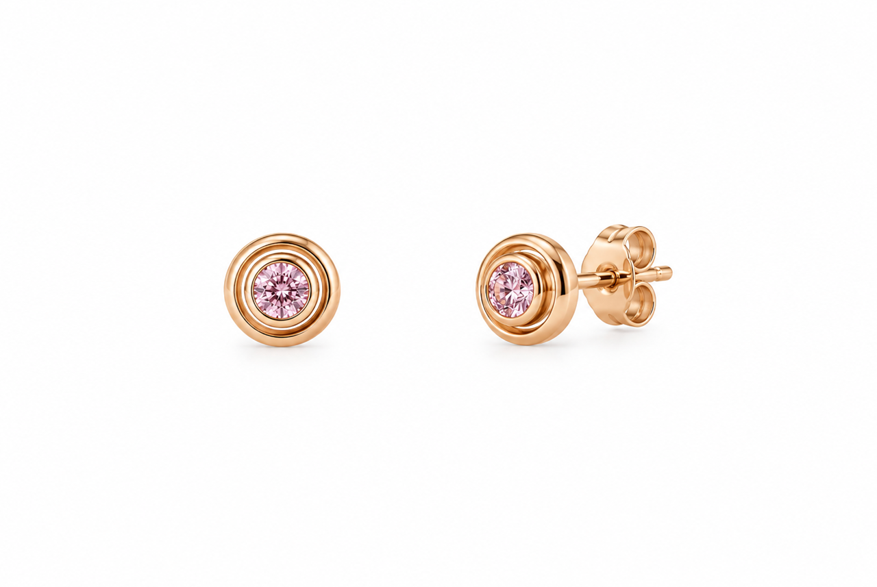 18ct rose gold Argyle pink diamond stud earrings featuring round brilliant cut pink diamonds in bezel settings with concentric circular surrounds.