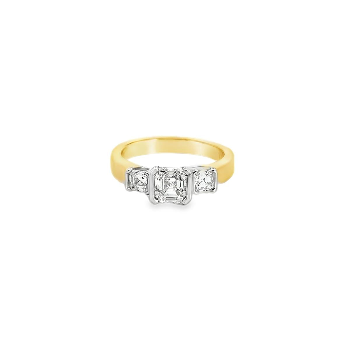 18ct yellow and white gold three stone ring featuring a 1.26ct Asscher cut centre diamond with semi-bezel settings and two side diamonds totalling 0.53ct.