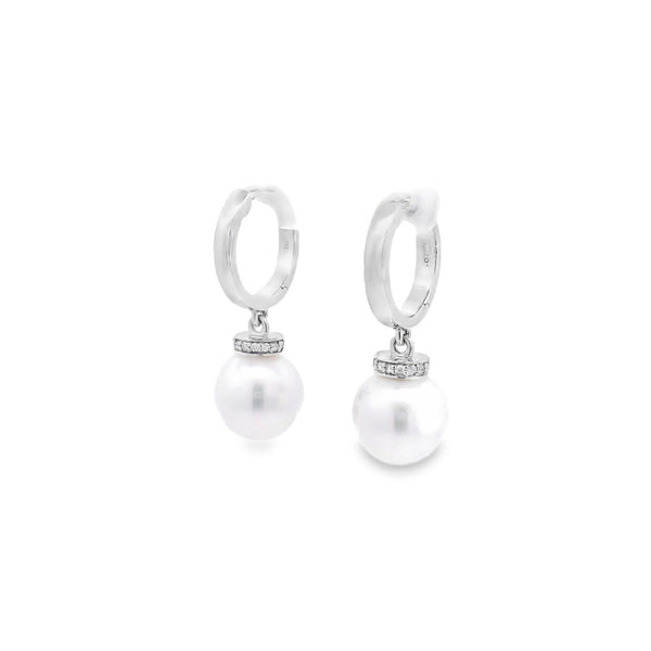 Autore 18ct white gold South Sea pearl and diamond huggie earrings with 9mm semi-oval pearls and articulated drop design.