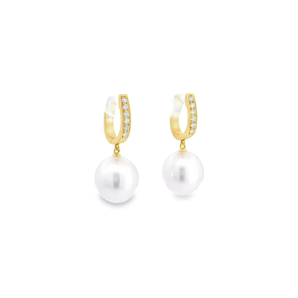 Autore 18ct yellow gold South Sea pearl and diamond huggie earrings with 9mm short oval pearls and articulated drop design.