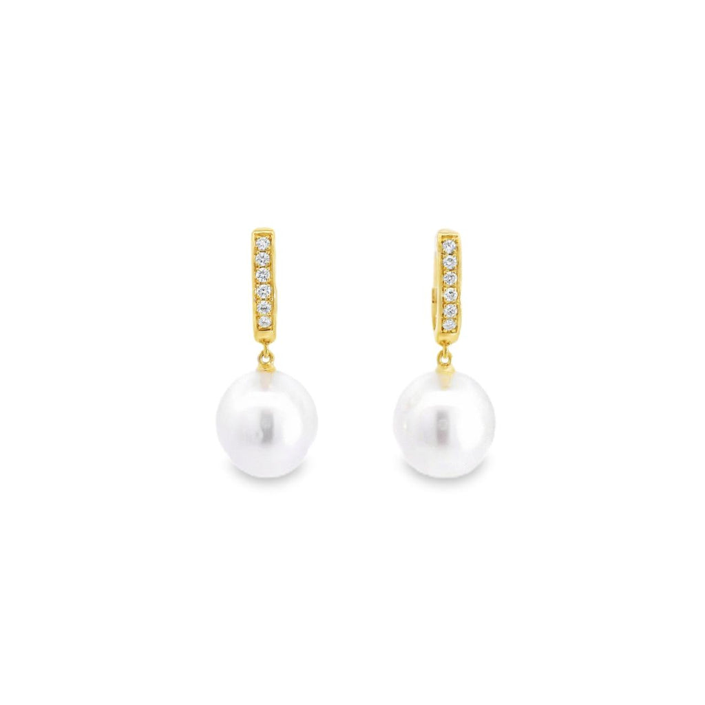 Autore 18ct yellow gold South Sea pearl and diamond huggie earrings with 9mm short oval pearls and articulated drop design.