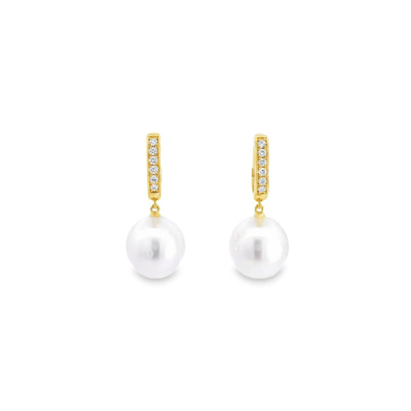 Autore 18ct yellow gold South Sea pearl and diamond huggie earrings with 9mm short oval pearls and articulated drop design.