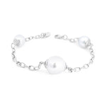Autore sterling silver bracelet featuring one 12mm and two 9mm semi-drop silver South Sea pearls set along an oval belcher link chain.