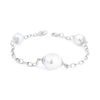 Autore sterling silver bracelet featuring one 12mm and two 9mm semi-drop silver South Sea pearls set along an oval belcher link chain.