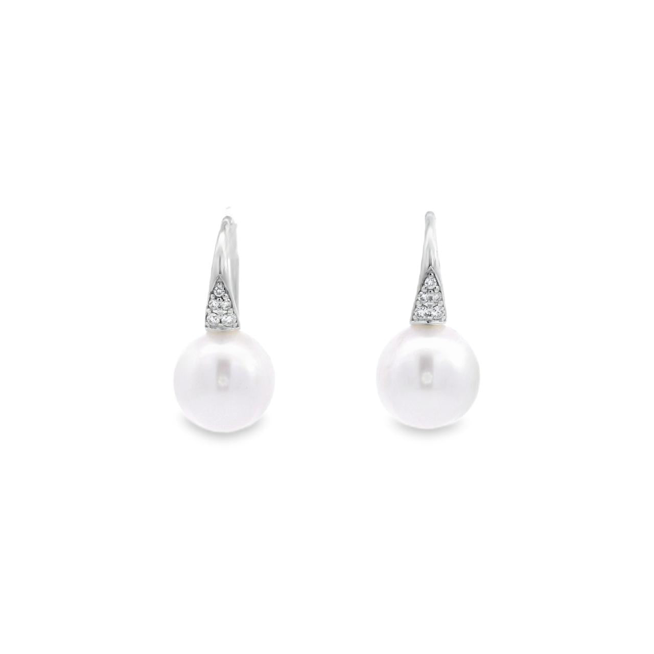 Autore white gold hook earrings with diamond cluster tops and 9mm South Sea pearl drops.