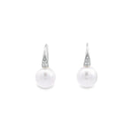 Autore white gold hook earrings with diamond cluster tops and 9mm South Sea pearl drops.