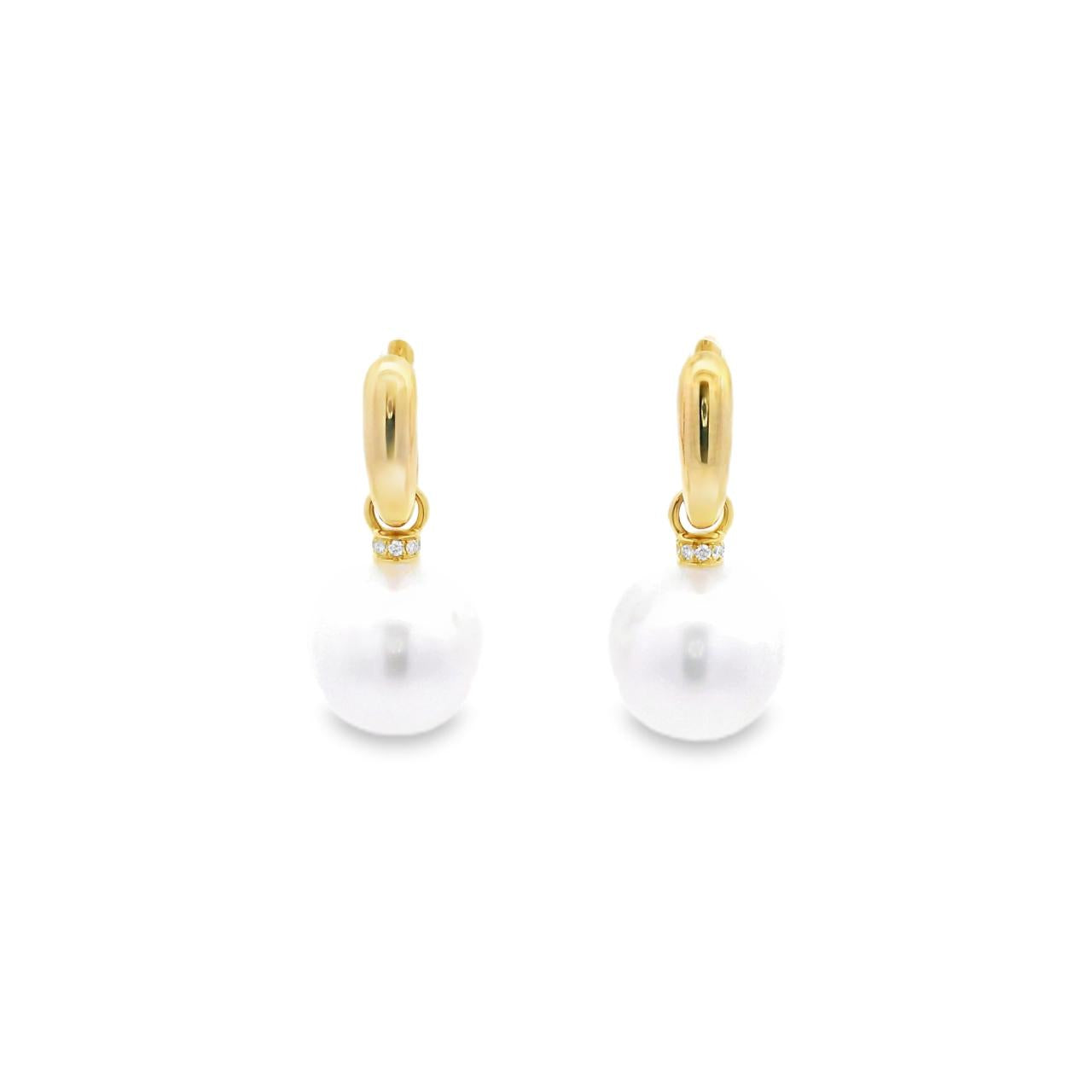 Autore yellow gold huggie earrings with diamond rondelles and 11mm South Sea pearl drops.