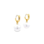 Autore yellow gold huggie earrings with diamond rondelles and 11mm South Sea pearl drops.