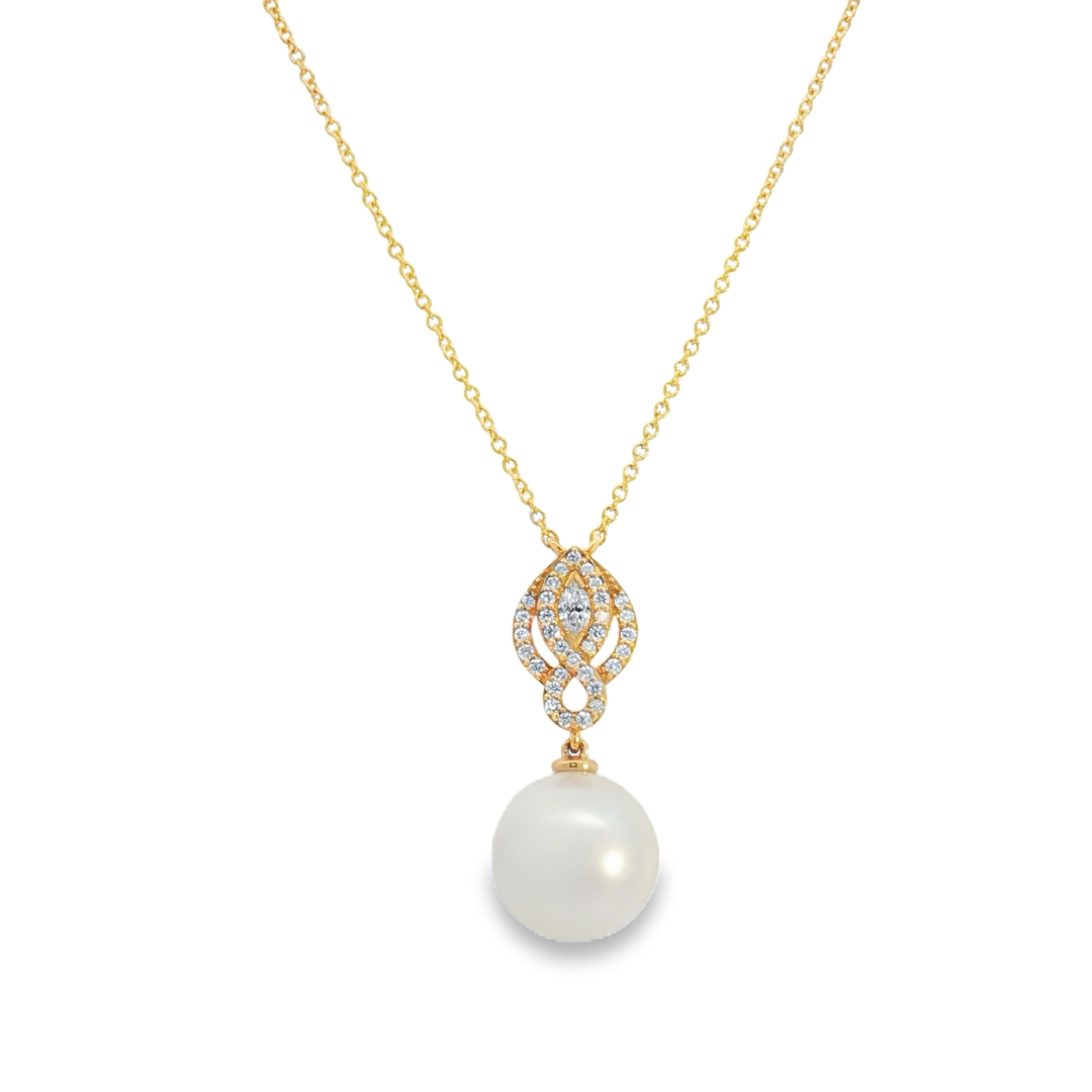 Autore yellow gold twist pendant with South Sea pearl and bead-set diamonds on fine trace link chain.