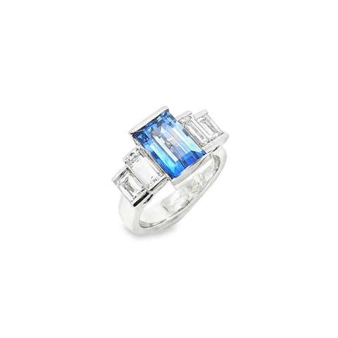 Platinum five-stone baguette sapphire and diamond ring with a 3.66ct centre sapphire and baguette diamond shoulders.