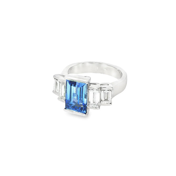 Platinum five-stone baguette sapphire and diamond ring with a 3.66ct centre sapphire and baguette diamond shoulders.