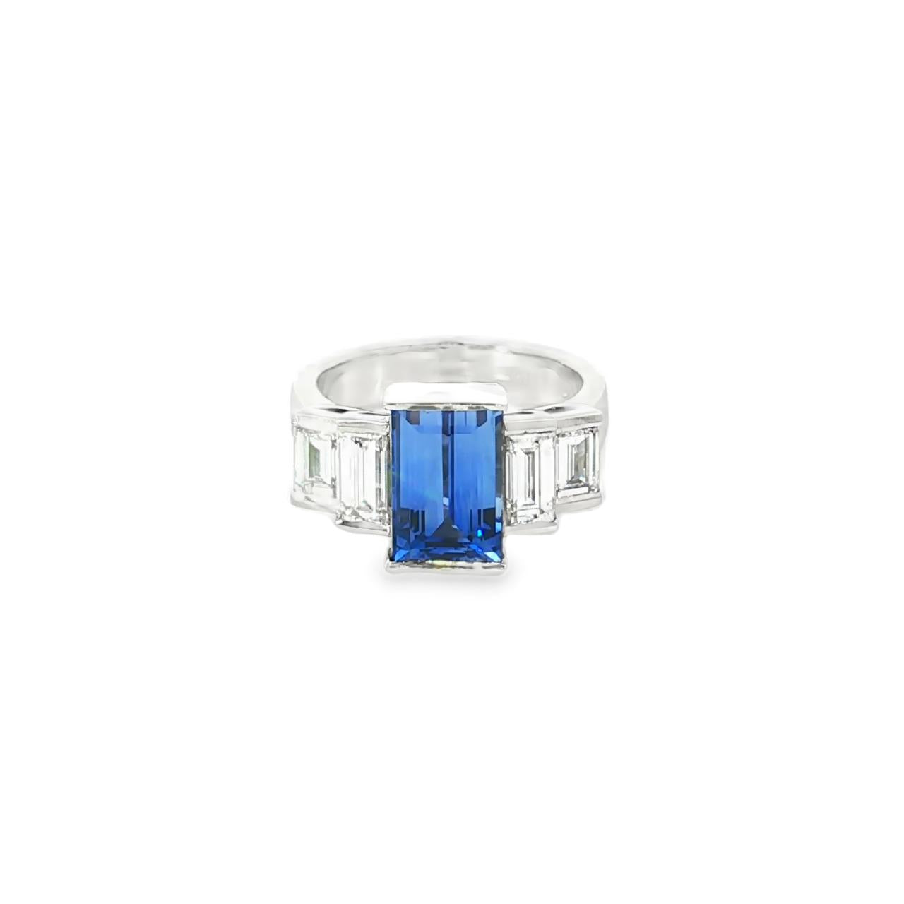 Platinum five-stone baguette sapphire and diamond ring with a 3.66ct centre sapphire and baguette diamond shoulders.