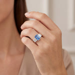 Platinum five-stone baguette sapphire and diamond ring with a 3.66ct centre sapphire and baguette diamond shoulders.