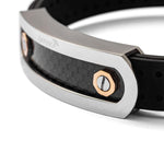 Baraka black rubber bracelet with stainless steel and carbon fibre centre and rose gold detail.