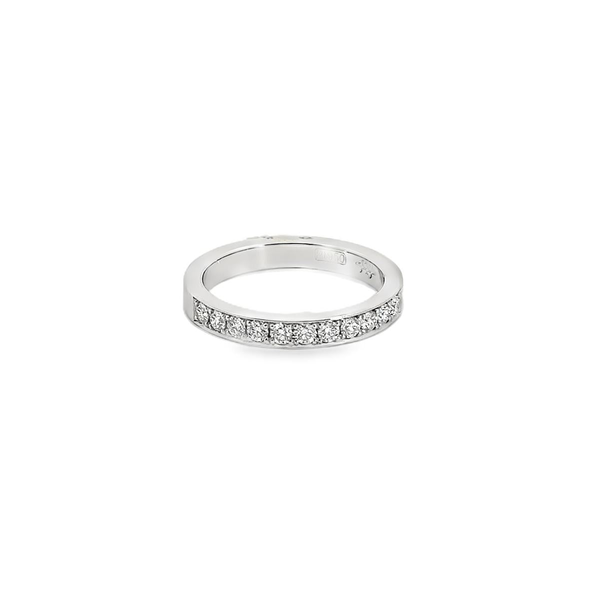Platinum band with bead-set round brilliant cut diamonds totalling 0.34ct.
