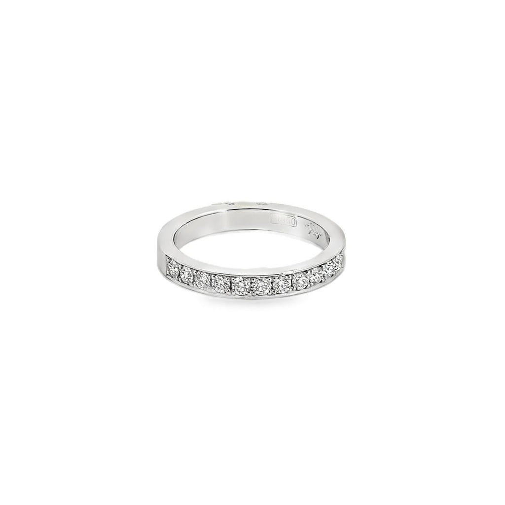 Platinum band with bead-set round brilliant cut diamonds totalling 0.34ct.