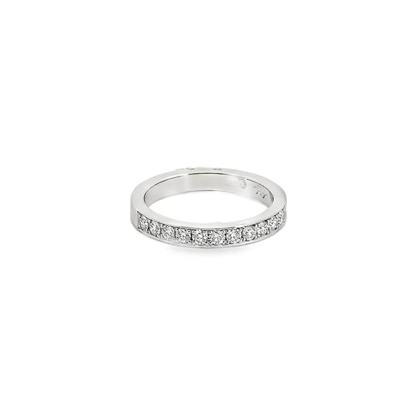 Platinum band with bead-set round brilliant cut diamonds totalling 0.34ct.