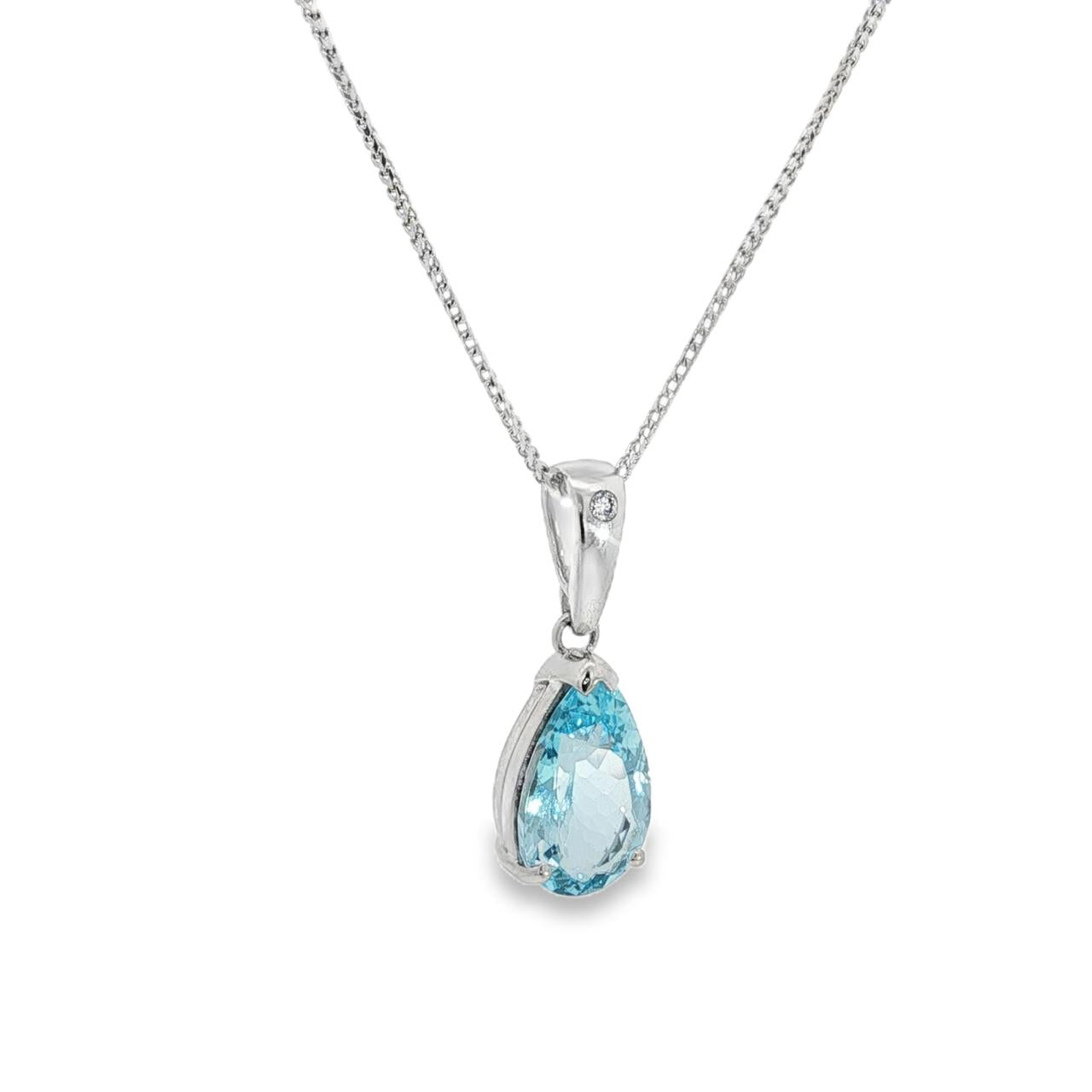 9ct white gold pendant featuring a 17x10mm pear-cut blue topaz in a v-cap and claw setting with articulated tapered pendant runner.