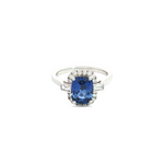 18ct white gold ring featuring a 2.21ct Ceylon sapphire flanked by tapered baguette and round brilliant cut diamonds totalling 0.50ct.