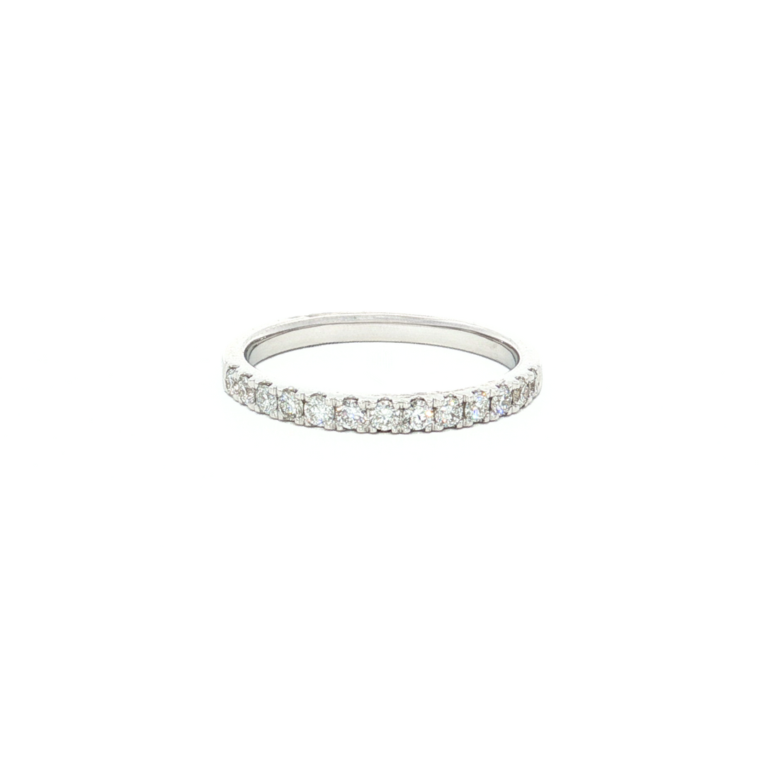 18ct white gold diamond wedding ring featuring a claw-set row of round brilliant cut diamonds across the top.