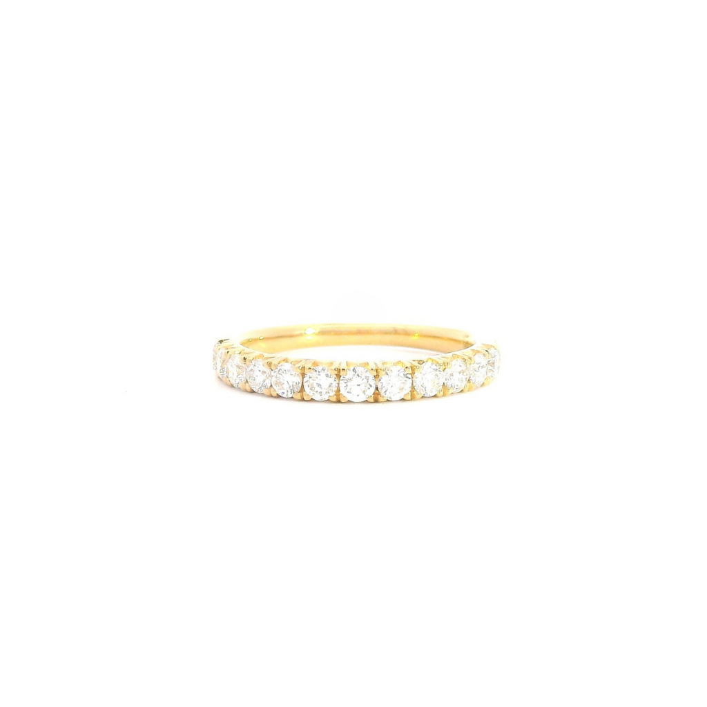 18ct yellow gold diamond ring featuring twelve round brilliant cut diamonds in a straight row claw setting across the top.