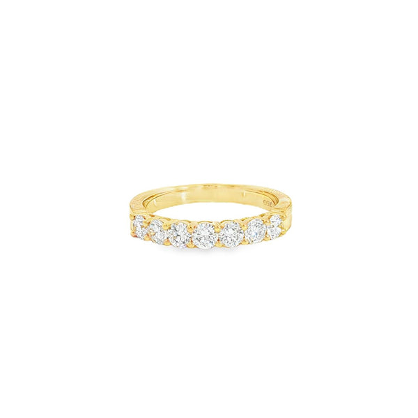 18ct yellow gold diamond ring featuring seven round brilliant cut diamonds in a straight row claw setting across the top.