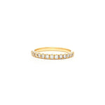 Diamond band in yellow gold with round brilliant cut diamonds