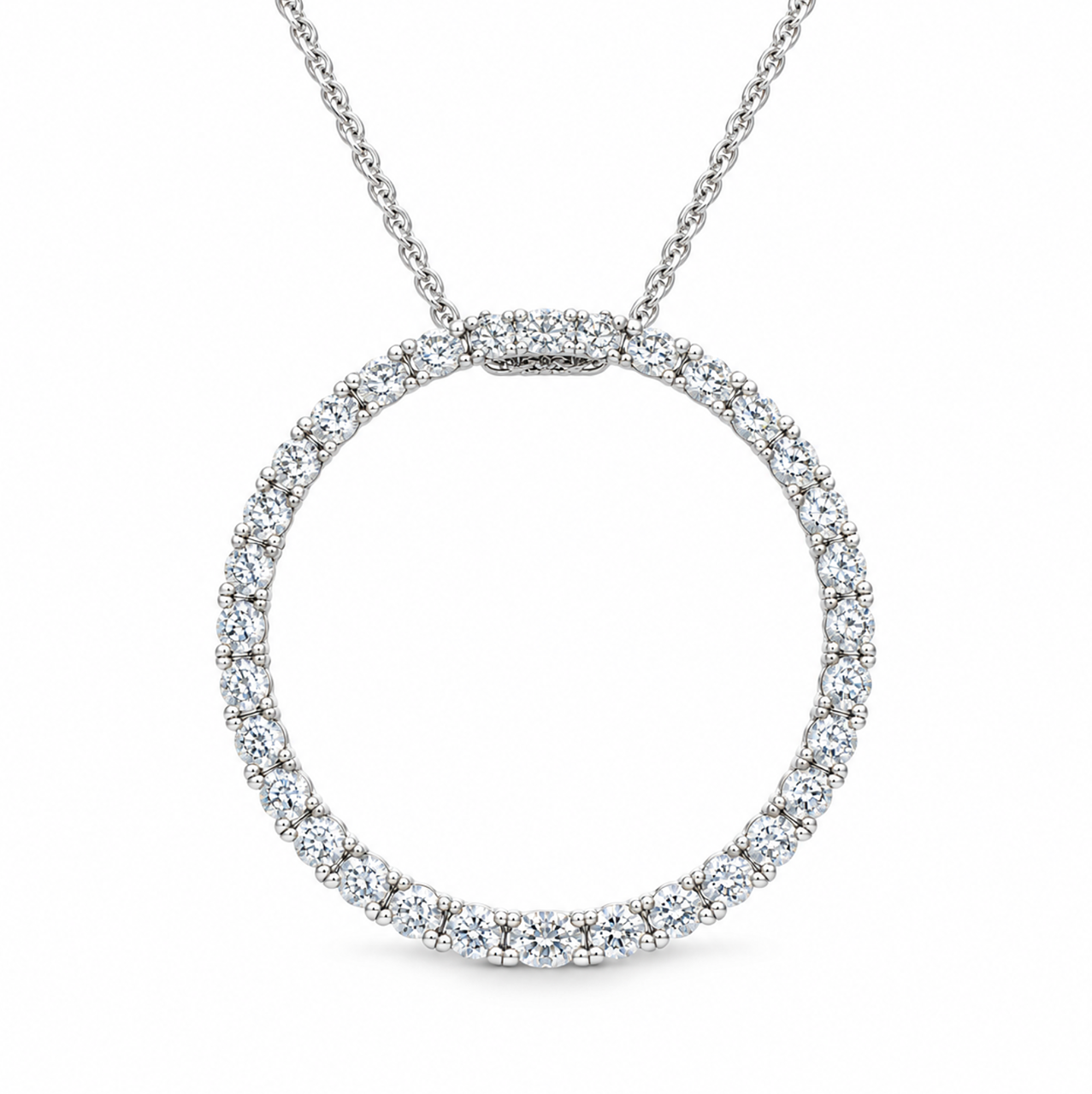 18ct white gold Diamond Circle of Life Pendant featuring 42 claw-set round brilliant cut diamonds totalling 1.61ct in a 30mm circular design.