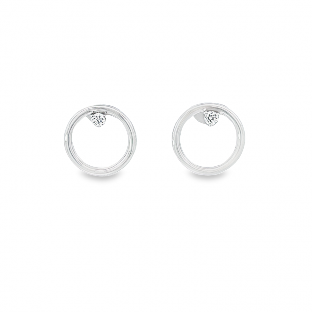 18ct white gold circle stud earrings with three-claw diamond setting at the top, featuring two round brilliant cut diamonds totalling 0.10 ct (G–H colour, SI clarity).