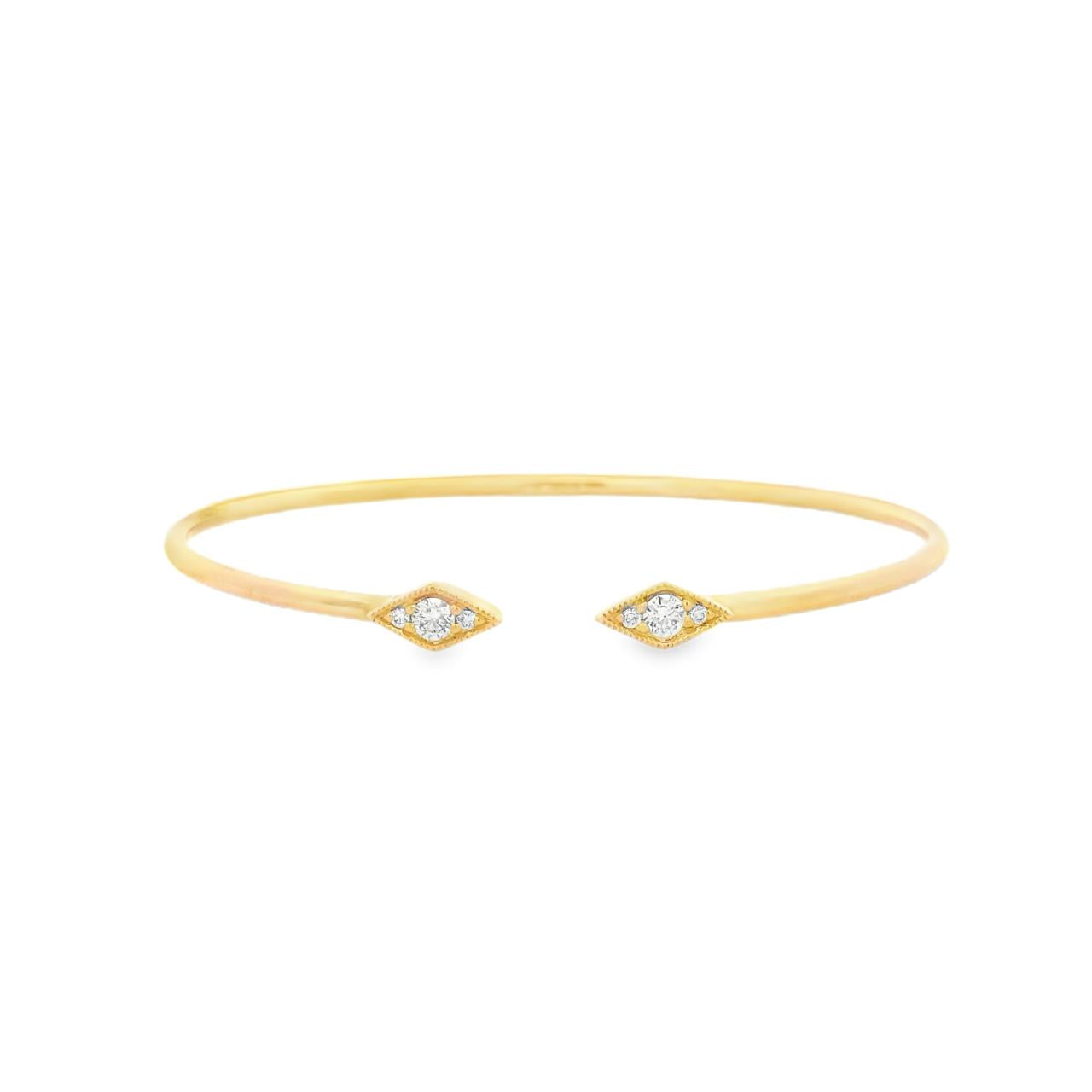 18ct yellow gold diamond bangle with oval profile and open gap at the top, featuring two rhombus-shaped cluster sections set with 6 round brilliant cut diamonds and finished with delicate millgrain detailing.