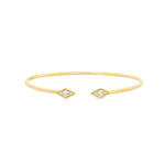18ct yellow gold diamond bangle with oval profile and open gap at the top, featuring two rhombus-shaped cluster sections set with 6 round brilliant cut diamonds and finished with delicate millgrain detailing.