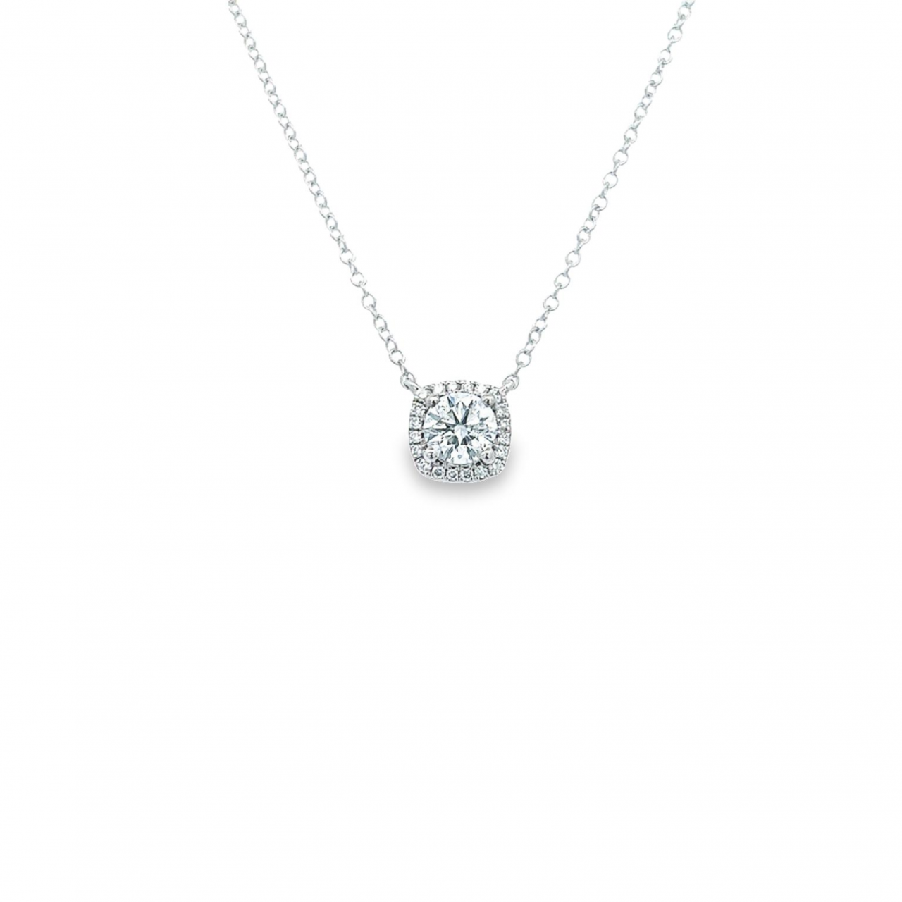 Platinum diamond cluster necklet featuring a 0.50ct GIA-certified F/SI1 round brilliant cut diamond with cushion-shaped halo surround on a fine trace link chain.