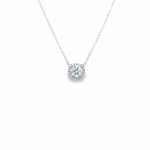 Platinum diamond cluster necklet featuring a 0.50ct GIA-certified F/SI1 round brilliant cut diamond with cushion-shaped halo surround on a fine trace link chain.