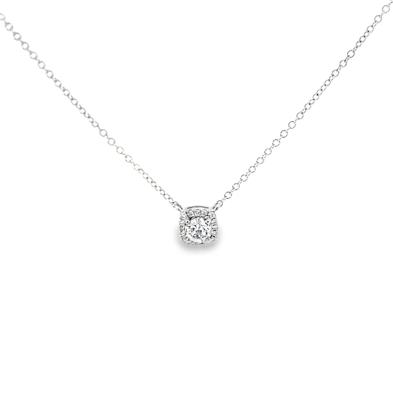 Platinum diamond cluster necklet featuring a four-claw centre diamond with cushion-shaped halo surround on a fine trace link chain.