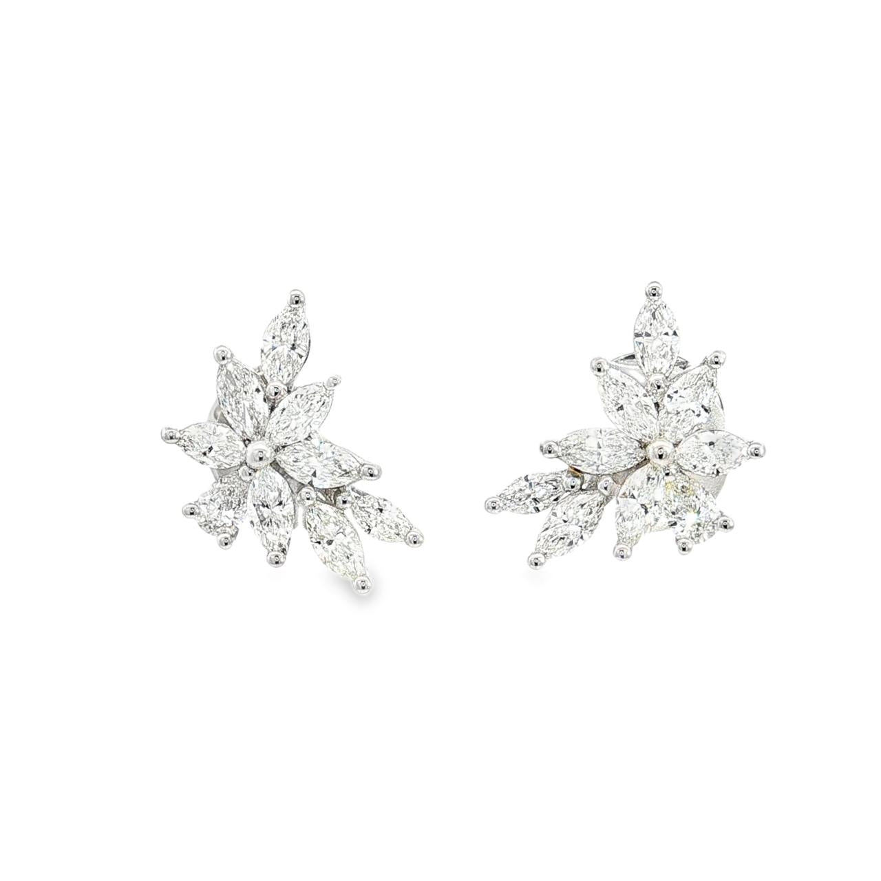 18ct white gold diamond cluster earrings featuring marquise and pear cut diamonds in a tiered multi-claw spray design with post and butterfly fittings.