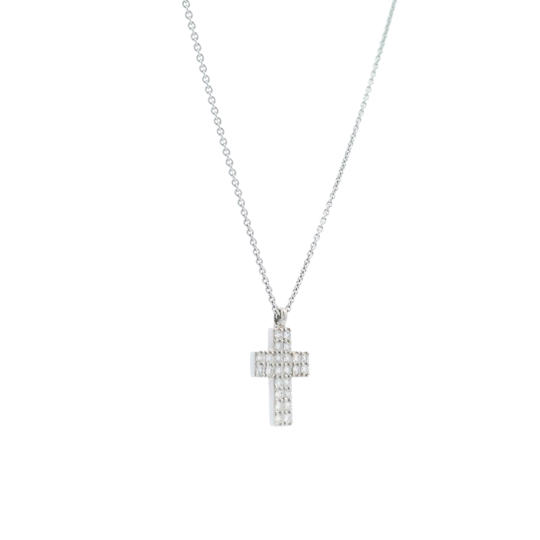 18ct white gold pavé diamond cross pendant featuring 0.34ct of round brilliant cut H/SI diamonds with a polished finish.