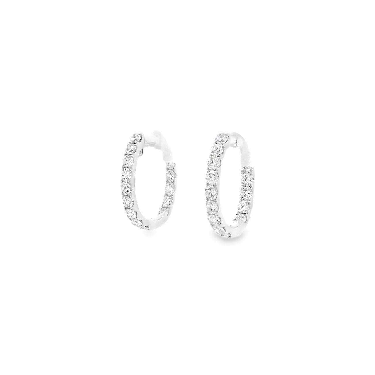 18ct white gold day/night huggie earrings with diamonds claw set down the front and inside back, featuring 30 round brilliant cut diamonds, G–H colour, SI clarity.