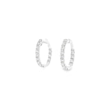 18ct white gold day/night huggie earrings with diamonds claw set down the front and inside back, featuring 30 round brilliant cut diamonds, G–H colour, SI clarity.