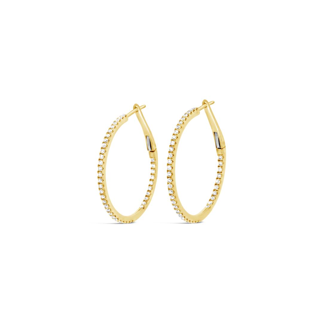 18ct yellow gold hoop earrings with claw-set round brilliant cut diamonds down the front and inside back, featuring 78 GH/SI diamonds totalling 0.47ct.