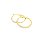 18ct yellow gold hoop earrings with claw-set round brilliant cut diamonds down the front and inside back, featuring 78 GH/SI diamonds totalling 0.47ct.