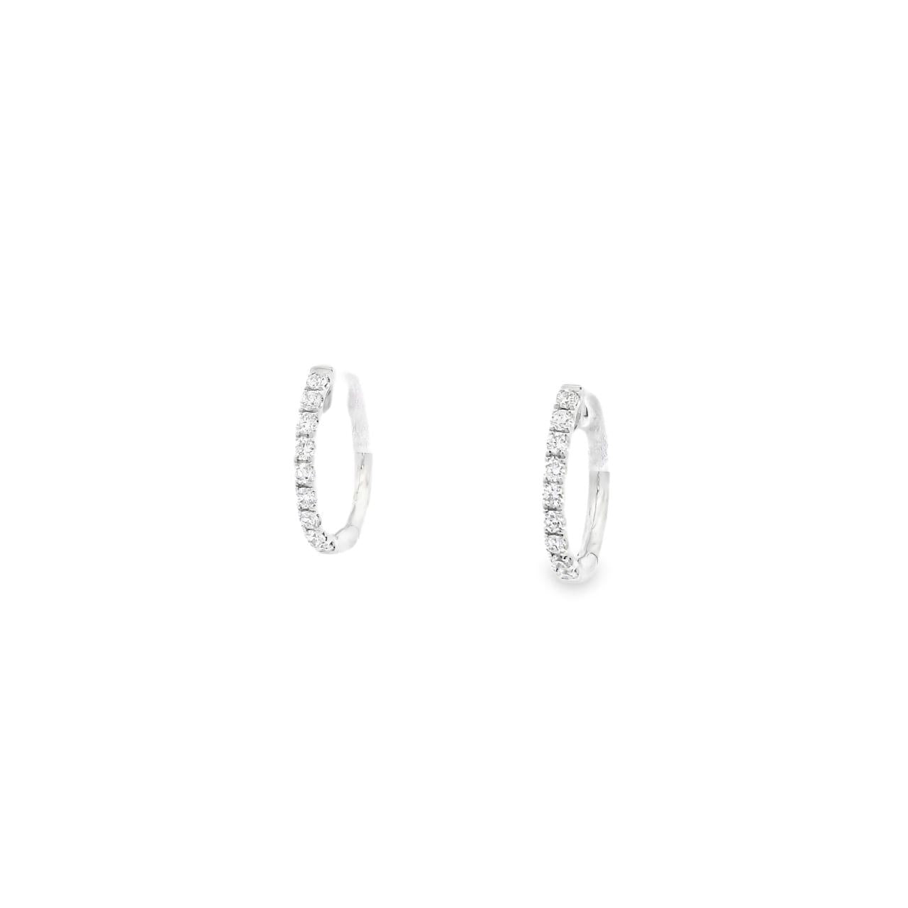 18ct white gold diamond huggie earrings featuring 18 claw-set round brilliant cut diamonds, G–H colour SI clarity, 14x13mm with hinged post and clip catch fittings.