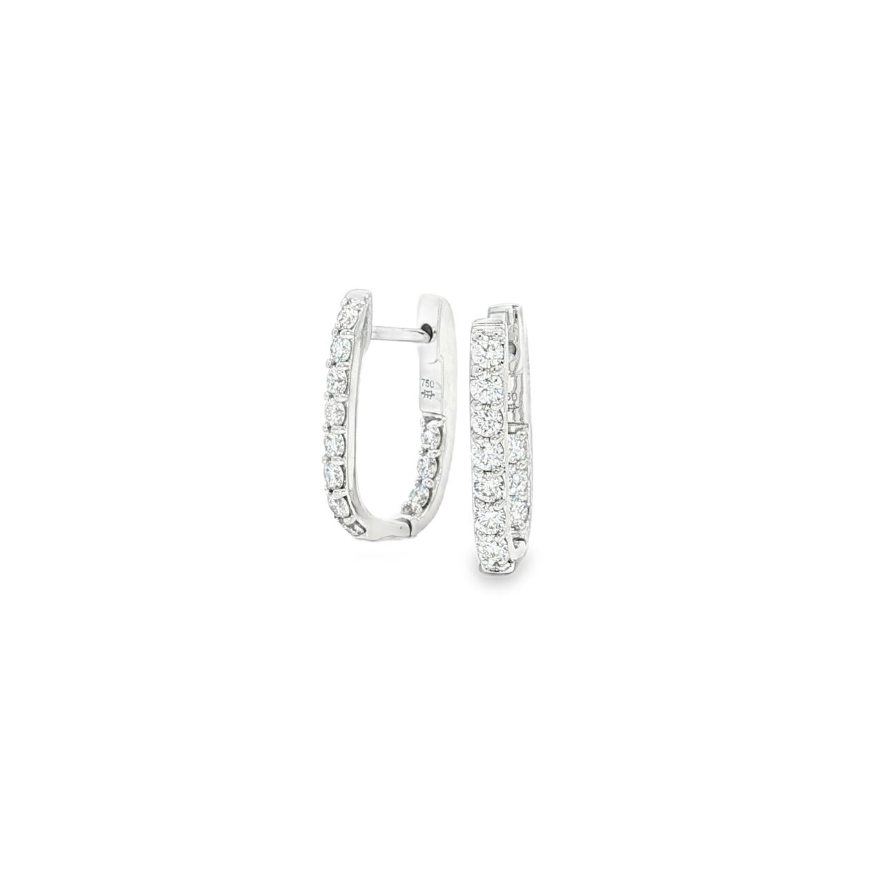 18ct white gold diamond huggie earrings featuring a hinged “U”-shape design with claw-set diamonds along the front and inside back.